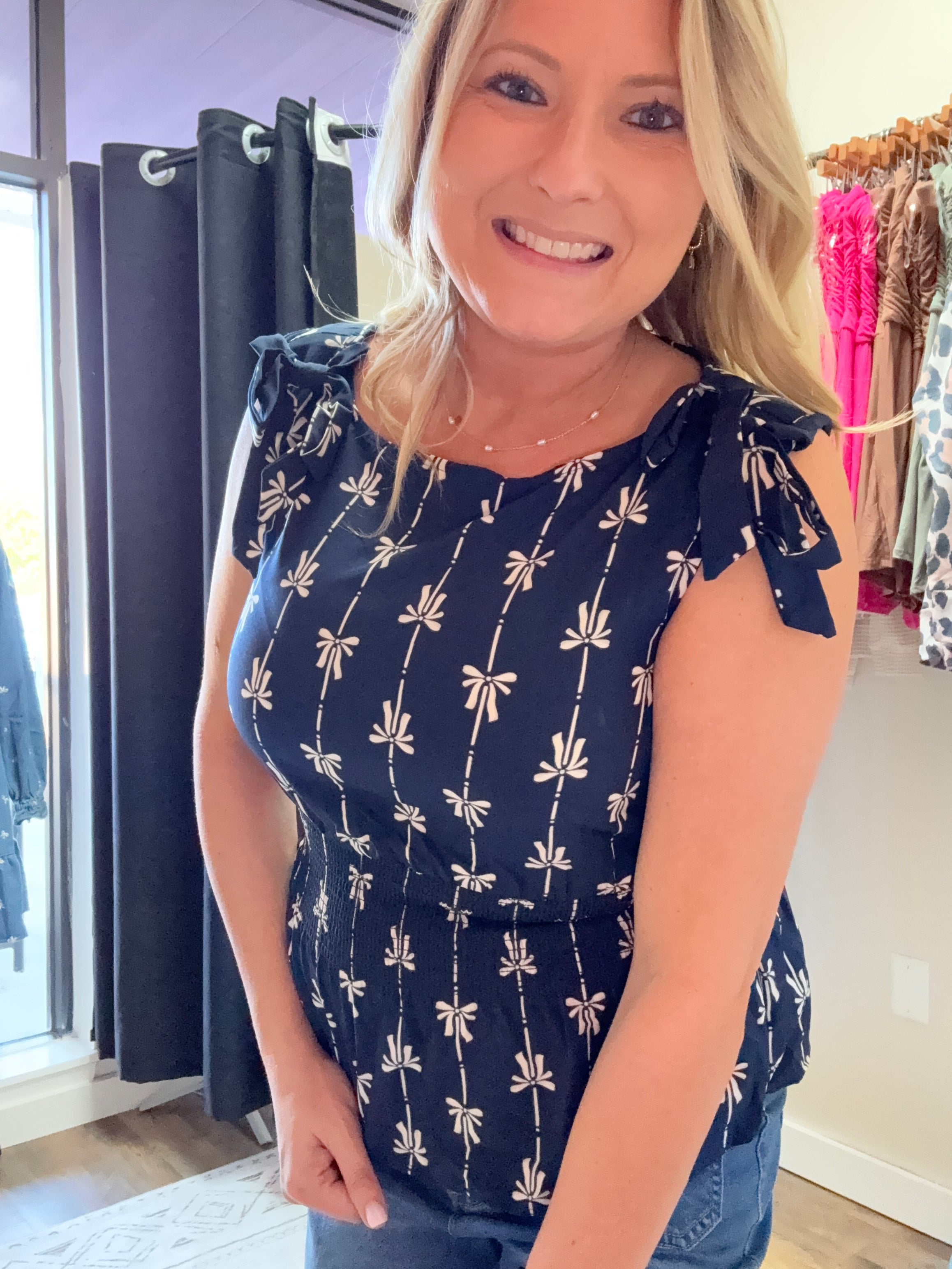 BOW LINE PATTERN TIE SHOULDER SLEEVELESS BLOUSE